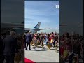 US President Trump dances while being greeted at peace summit in Malaysia
