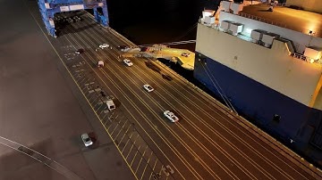 Aerial Drone Timelapse of Vehicle Carrier Ship Unloading