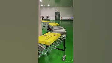 Warehouse extendable powered roller conveyor for loading cartons