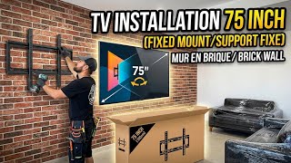 Mounting a 75-inch TV on a brick wall with a fixed wall mount. 📺🧱