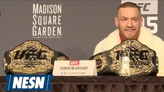 Conor McGregor Steals Eddie Alvarez's Belt At UFC 205 Presser