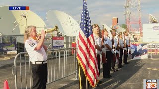 Operation Honor Guard veterans perform a 21-gun salute, 'Taps'