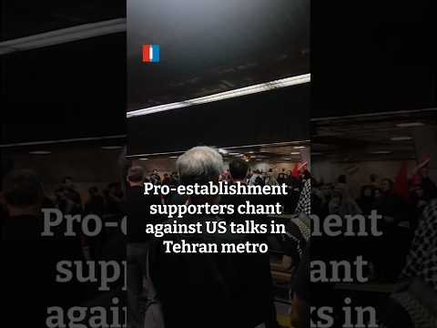 Pro-establishment supporters chant against US talks in Tehran metro