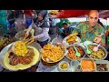 INSANE Indonesian street food in SURABAYA - World&#39;s #1 Soup + Cow&#39;s Nose Salad + Spicy seafood