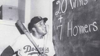 Don Newcombe -  the first pitcher to win the Cy Young, MVP, and Rookie of the year