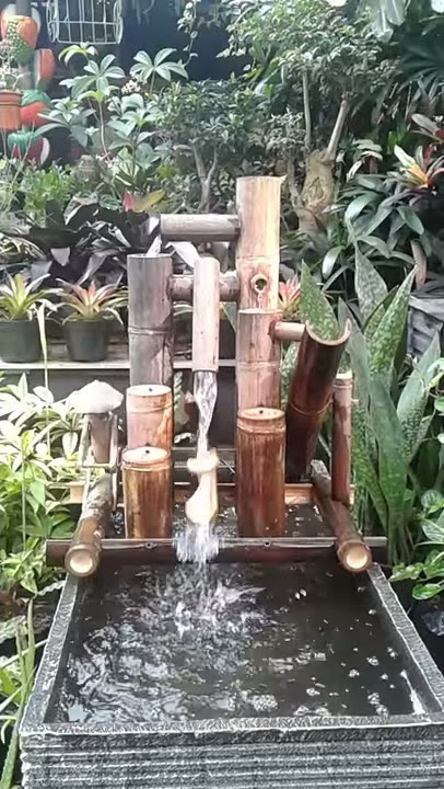 Air mancur kincir bambu dan air tumpah