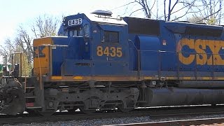 Four Engines Pulling A CSX Mixed Manifest Freight Train
