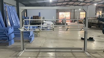 Automatic fabric loading machine