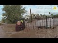 RAW: Body cam captures rescue of elderly man found clinging to fence in Apache Junction floodwaters