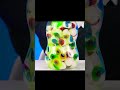 Wednesday pours green goo into a jar