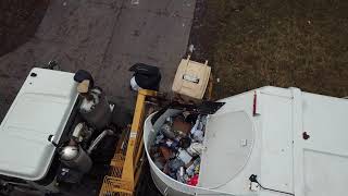 Got Heavy Garbage Cans? Then Get A Heil Rapid Rail Garbage Truck