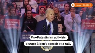 Pro-Palestinian activists interrupt Biden at rally | REUTERS