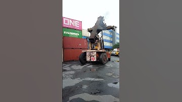 Kalmar Reach stacker with a tilting spreader for container handling
