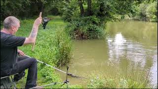 Paul landing a small carp at Little Cansiron Farm