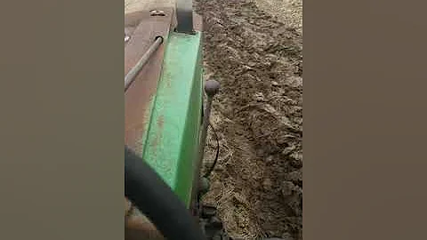 John deere 70 plowing