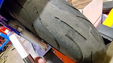 use a tread depth gauge to check tire wear