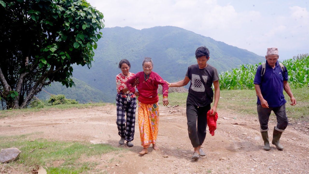 jungle man went down to village to help jungle man wife's sick sister taking her from the hospital