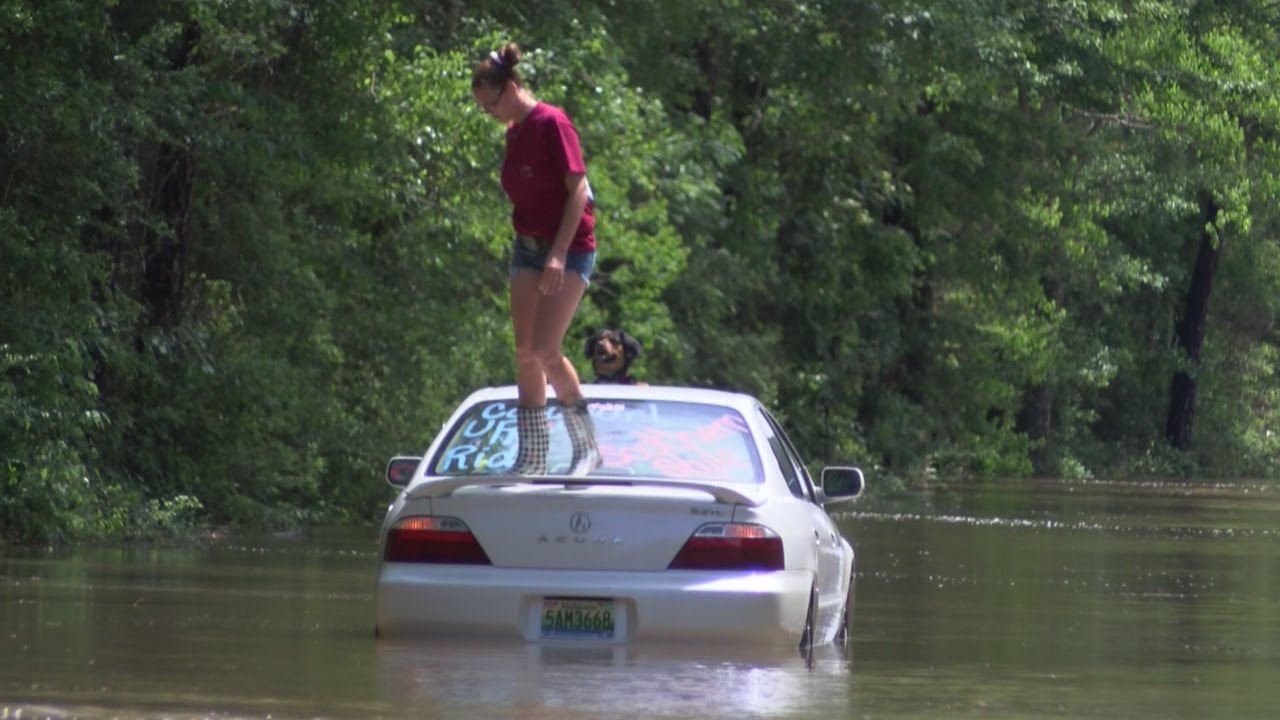 Stuck In Water Woman stuck in water, is helped by good samaritans - YouTube