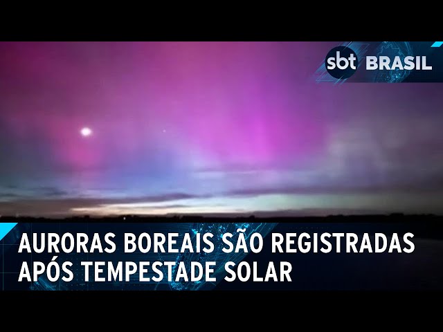 Auroras boreais em locais incomuns são registradas após tempestade solar | SBT Brasil (11/05/24) class=