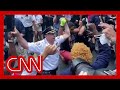 NYPD chief takes a knee with George Floyd protesters