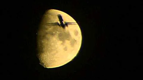 Moon with Jet Fly-By by Donald Brub