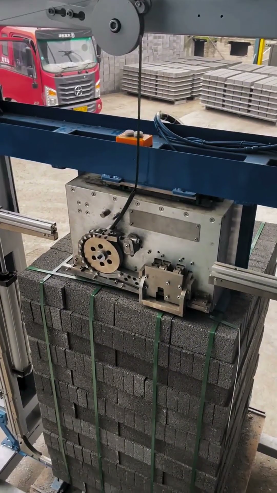 Automated strapping of bricks- Good tools and machinery make work easy