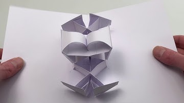 Multiple double curved pop-up mechanisms