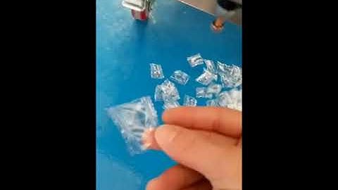Automatic screw counting packaging machine for one tiny screw bagging