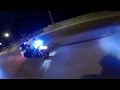 POLICE CHASE Crazy motorcyclist as it wheelies in on coming traffic while in pursuit