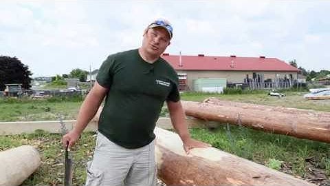 How To Build A Log Home | Log Peeling With A Drawknife