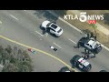 Shooting suspect in custody after police pursuit in Mid-Wilshire area of Los Angeles