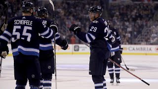 Laine rips one-timer stick side past Lack