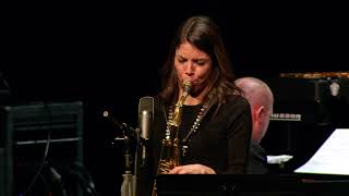 Free Fall (featuring Melissa Aldana) | U.S. Navy Band
Free Fall | Melissa Aldana
Free Fall is the way I felt after moving to New York.
Melissa Aldana was born in Santiago, Chile, and grew up in a musical family. Both her father and grandfather were saxophonists, and she took up the instrument at age six under her father Marcos’ tutelage. Aldana began on alto, influenced by artists such as Charlie Parker and Cannonball Adderley, but switched to tenor upon first hearing the music of Sonny Rollins, who would become a hero and mentor. She performed in Santiago jazz clubs in her early teens and was invited by pianist Danilo Pérez to play at the Panama Jazz Festival in 2005.
Aldana moved to the U.S. to attend the Berklee College of Music, and the year after graduating she released her first album Free Fall on Greg Osby’s Inner Circle label in 2010, followed by Second Cycle in 2012. In 2013, at 24, she became the first female instrumentalist and the first South American musician to win the Thelonious Monk International Jazz Saxophone Competition, in which her father had been a semi-finalist in 1991. After her win, she released her third album Melissa Aldana & Crash Trio (Concord). Aldana is also an in-demand clinician and educator and has recently been appointed to the faculty of the New England Conservatory’s Jazz Studies Department. Free Fall (featuring Melissa Aldana) | U.S. Navy Band