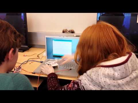 grade 7/8 kids assembling their plotclock