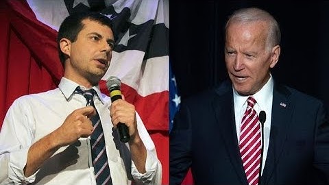 2020: PETE BUTTIGIEG and JOE BIDEN confronted by protesters first day in New Hampshire post-Iowa
