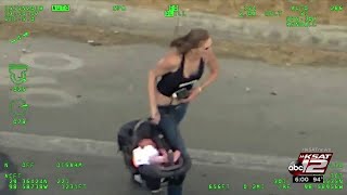 Video: Wild video shows woman take off with baby in carrier after crashing car in chase