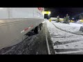 Rookie trucker struggles to slide tandems on ice.  First Winter.