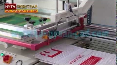 Screen printing machine with auto unloading system