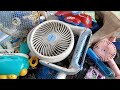 pile of old mini fans, homemade fans in sacks - unexpectedly found the fan smashed like porridge