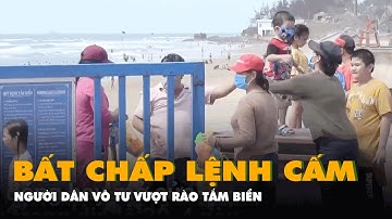 Nhiều người bất chấp biển cấm vượt rào xuống biển Vũng Tàu tắm
