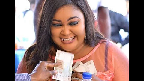 Ireti Osayemi Dance as they shower her with money at Dayo Amusa Dad Burial ceremony in Lagos.