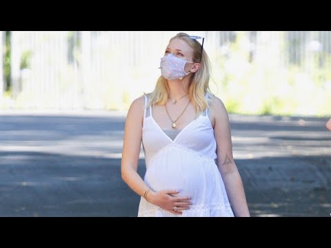 Sophie Turner Shows Off Her BABY BUMP With Joe Jonas!