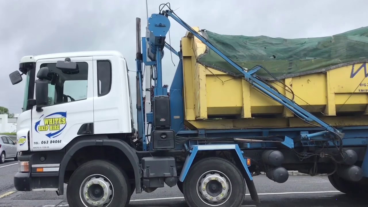 Whites Skip Hire with rolloff skip YouTube