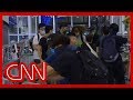 Chaos erupts at Hong Kong airport as riot police take on protesters