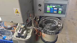 Automatic denim shank button attaching machine with logo reading + washer feeding + hole punching 