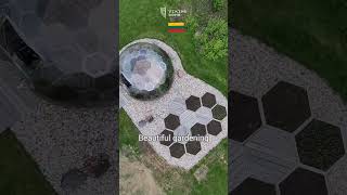 Backyard landscaping design. Greenhouse geodesic dome