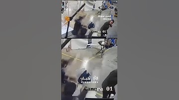 CCTV footage shows robot attacking handlers in factory