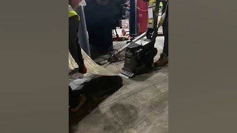 Removing vinyl flooring using NFE 6280 Commander floor stripper.