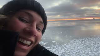 Hundreds of Pancake Ice Covering Water Surface as Lady Provides Commentary