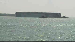 Crews finish draining fuel tanks of capsized cargo ship off Georgia coast